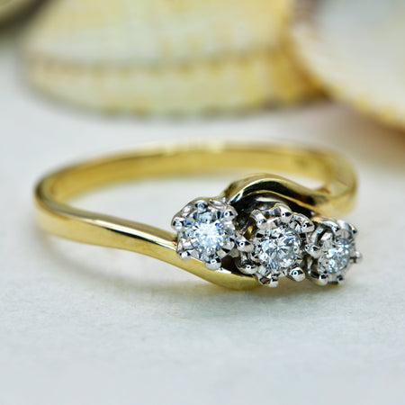 The Contemporary 9ct Brilliant Cut Three Diamond Twist Ring - Antique Jewellers