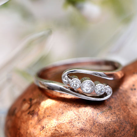 The Early 20th Century White Swirl Diamond Trilogy Ring - Antique Jewellers