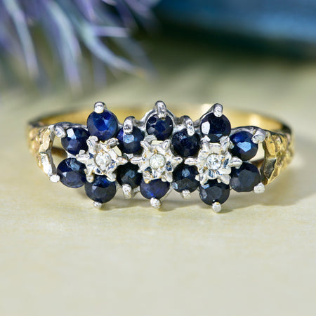 The 1981 Sapphire and Diamond Trio of Flowers Ring - Antique Jewellers
