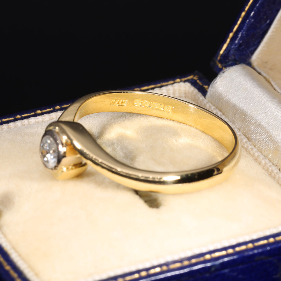 The Vintage 1996 Brilliant Cut Diamond Solitaire Swirl Ring