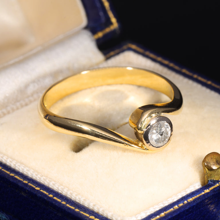 The Vintage 1996 Brilliant Cut Diamond Solitaire Swirl Ring