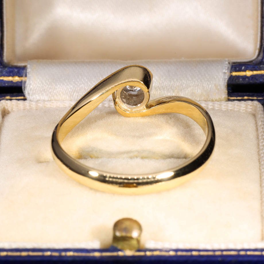 The Vintage 1996 Brilliant Cut Diamond Solitaire Swirl Ring