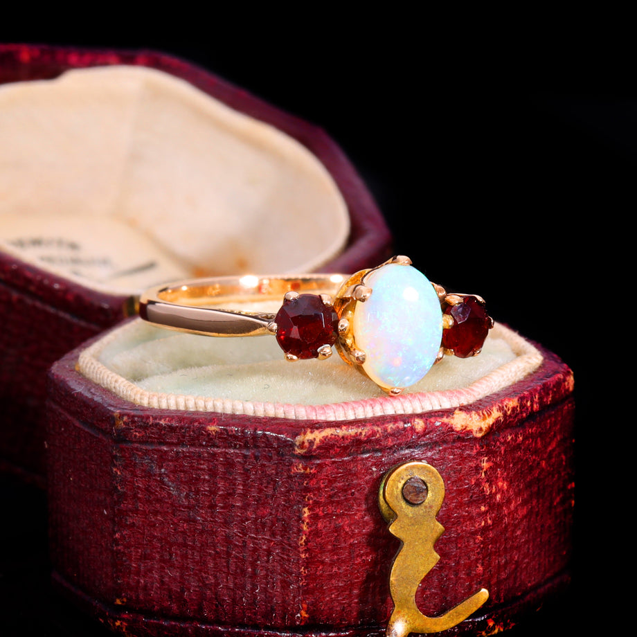 The Vintage 1982 Opal And Garnet 3 Stone Ring