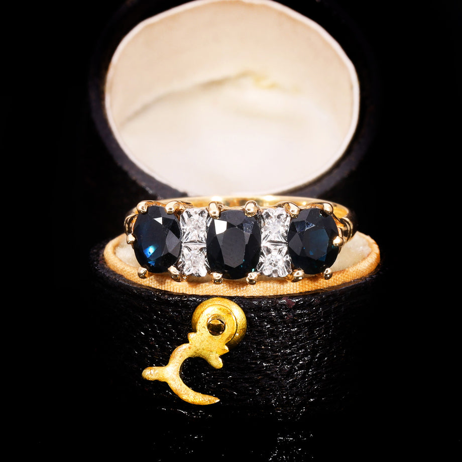 The Vintage Three Cushion Cut Sapphire And Diamond Ring