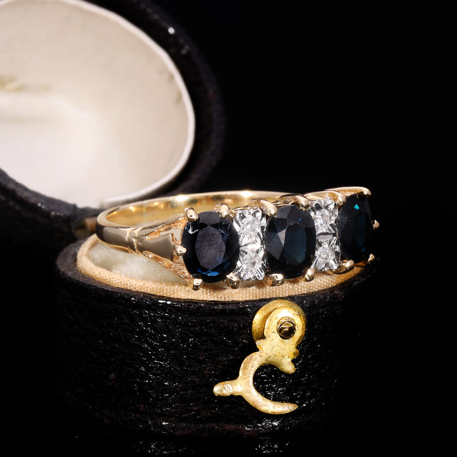 The Vintage Three Cushion Cut Sapphire And Diamond Ring