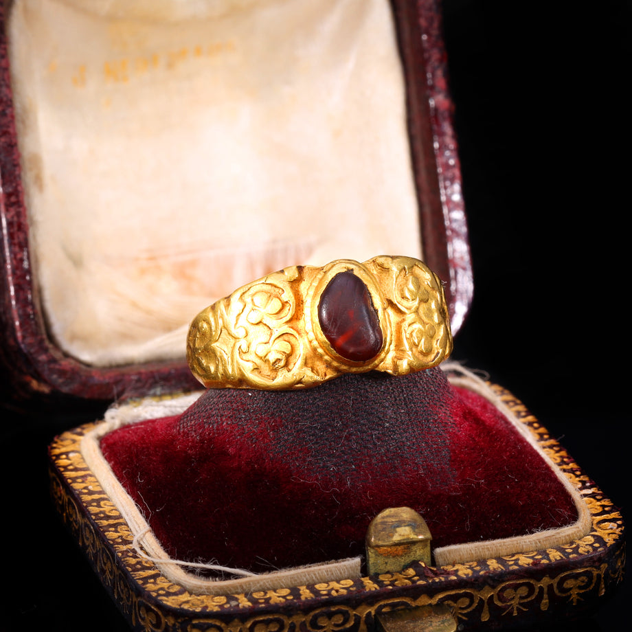 The Ancient Roman Garnet Cabochon Engraved Clover Ring