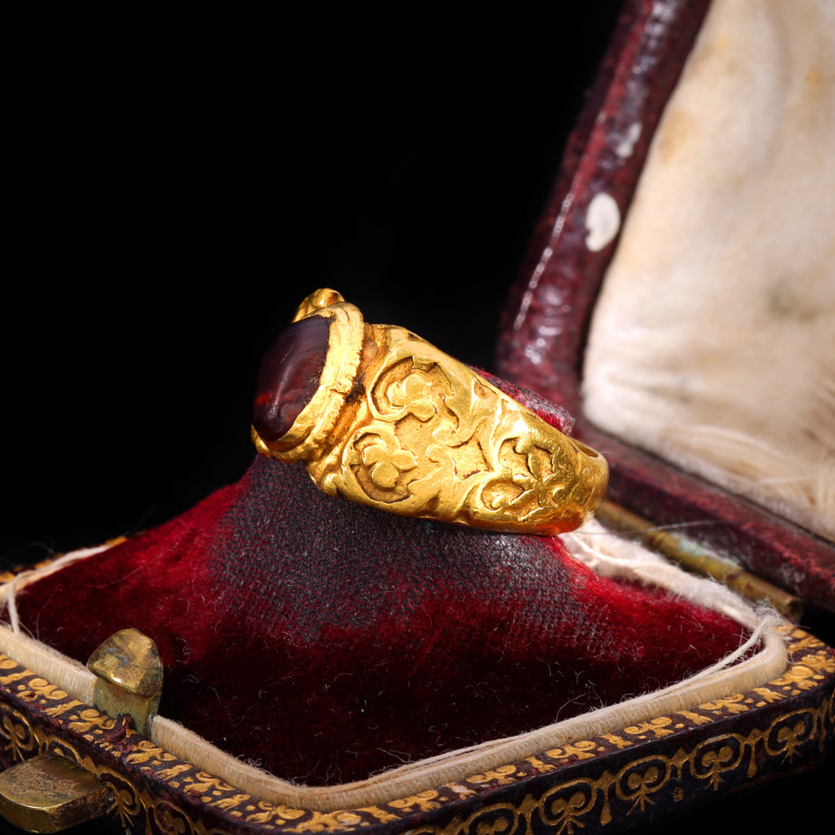 The Ancient Roman Garnet Cabochon Engraved Clover Ring