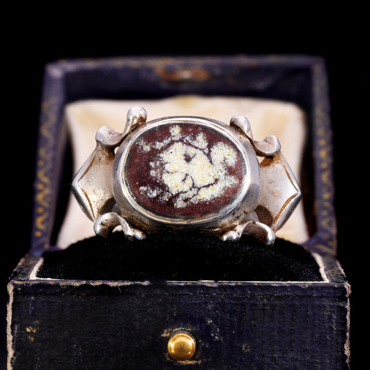 Front view of 1601 Renaissance silver memento mori ring with oval portrait bezel