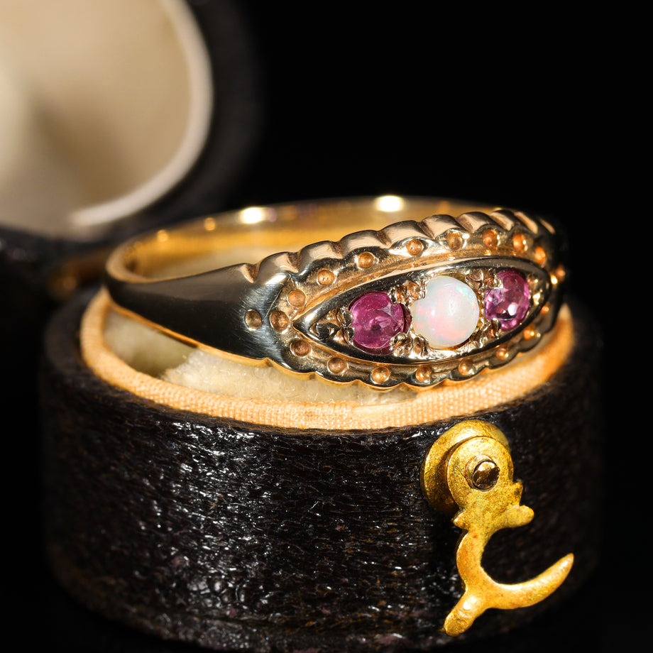 The Vintage 1997 Ruby and Opal Boat Ring