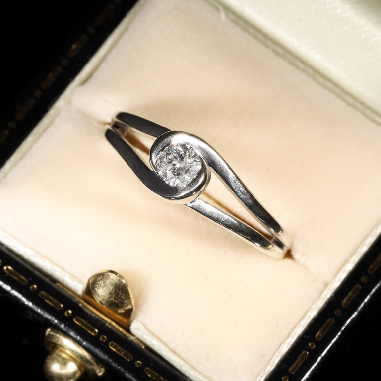 The Contemporary Light Solitaire Diamond Twist Ring