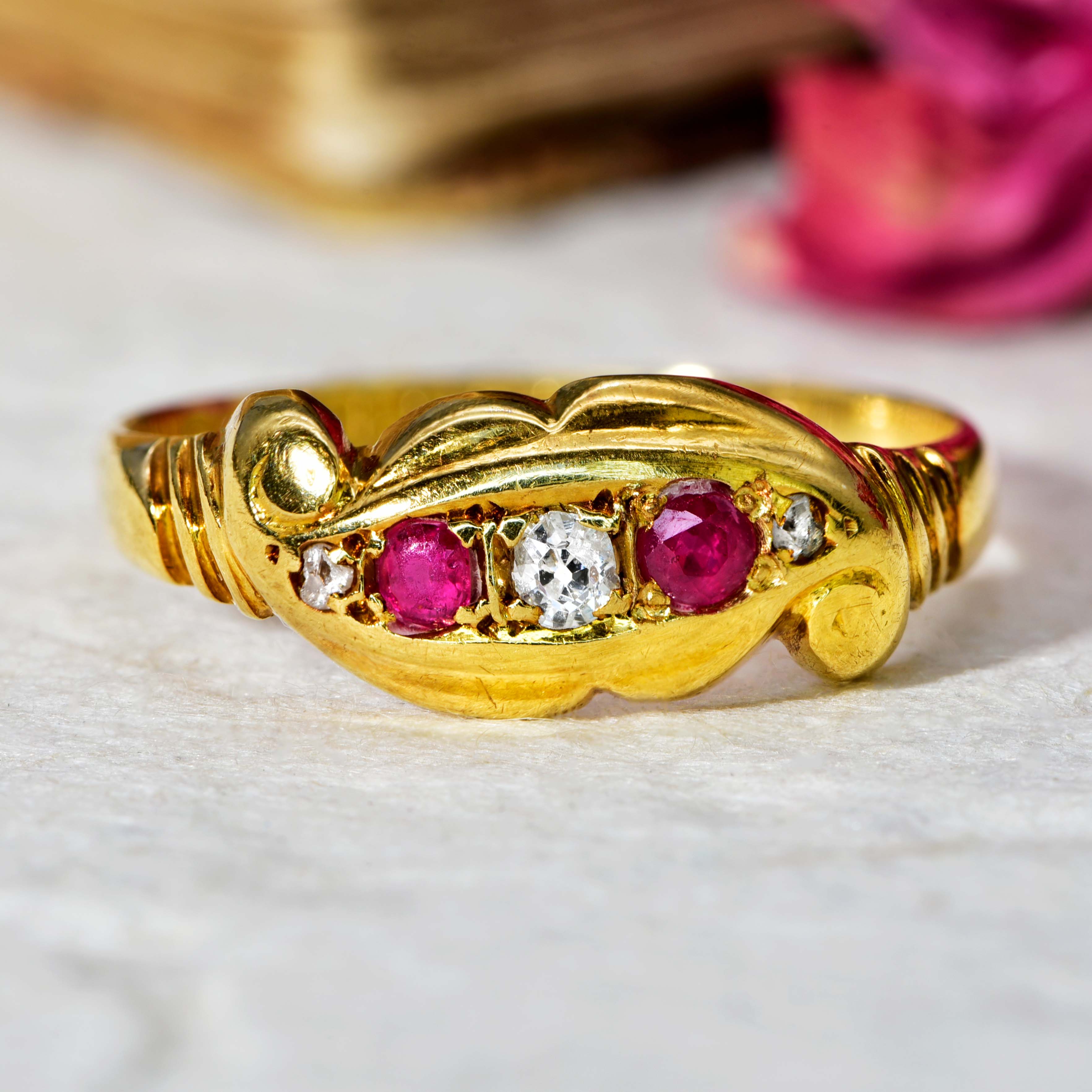 The Antique 1919 Diamond and Red Stone Scroll Ring - Antique Jewellers