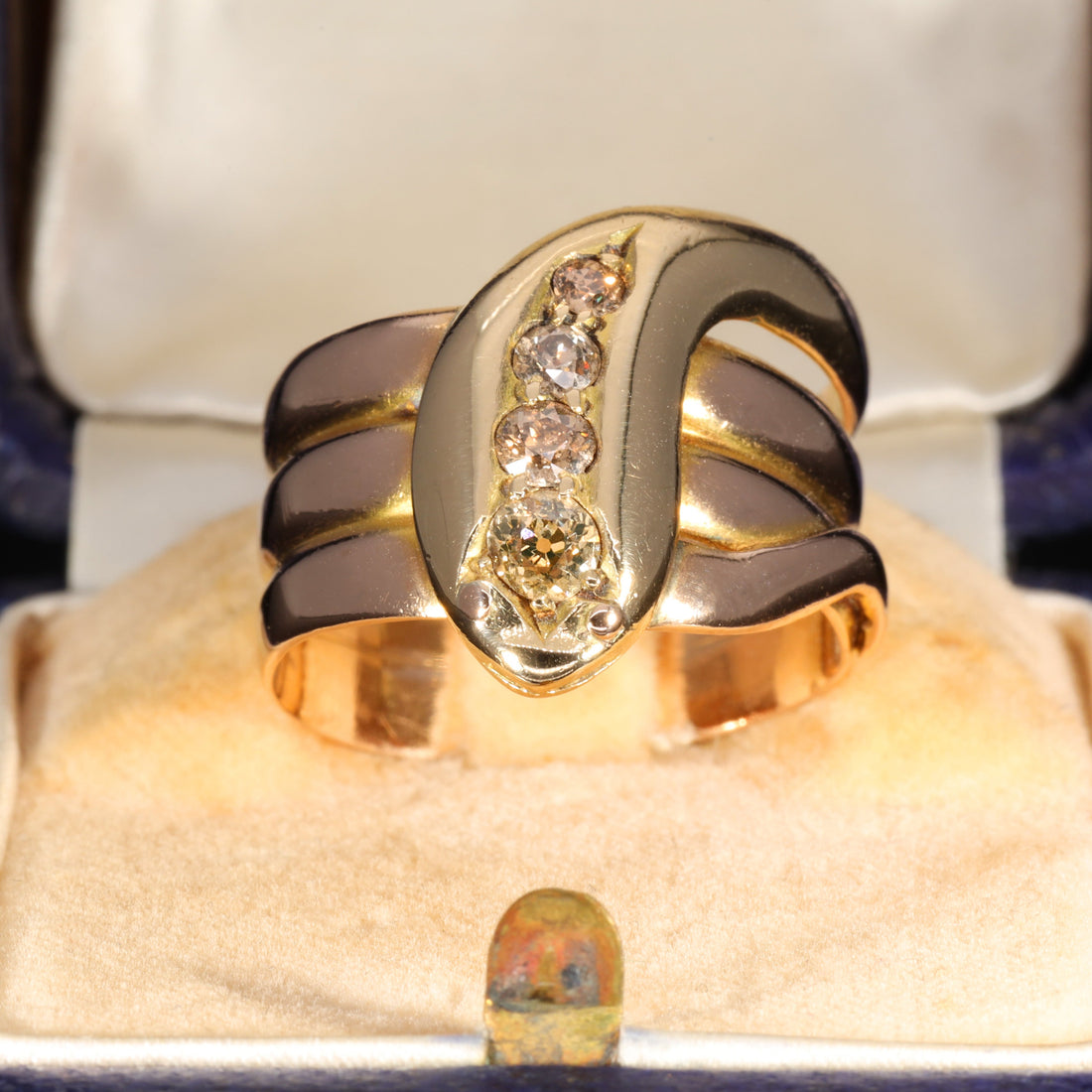 Victorian 18ct gold coiled snake ring with graduating champagne diamonds, echoing the snake engagement ring Prince Albert gave Queen Victoria in 1839
