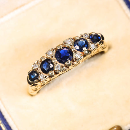 The Vintage 1994 Five Sapphire And Diamond Scroll Regal Ring