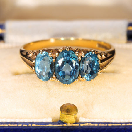 The Vintage 1990 Three Blue Topaz Scroll Ring