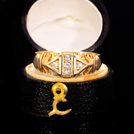 Edwardian five stone diamond ring in 18ct yellow gold with geometric patterned gallery and old cut diamonds, hallmarked 1902
