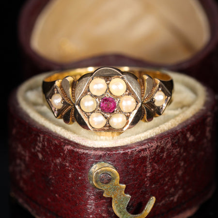 The Antique 1885 Victorian Pearl and Ruby Daisy Ring