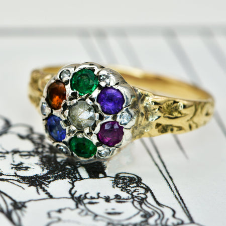 Victorian DEAREST acrostic ring in gold with diamond, emerald, amethyst, ruby, sapphire, and topaz spelling a hidden message