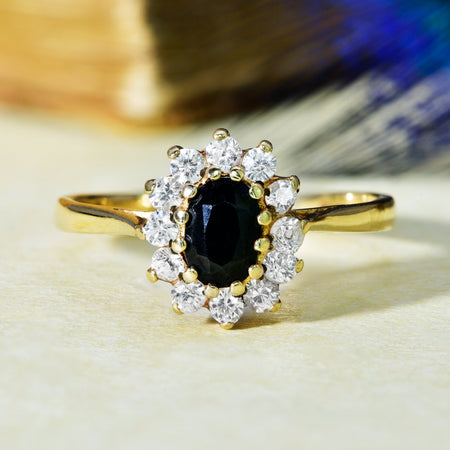 The Vintage 1985 Sapphire and Clear Gemstone Flowerhead Ring - Antique Jewellers