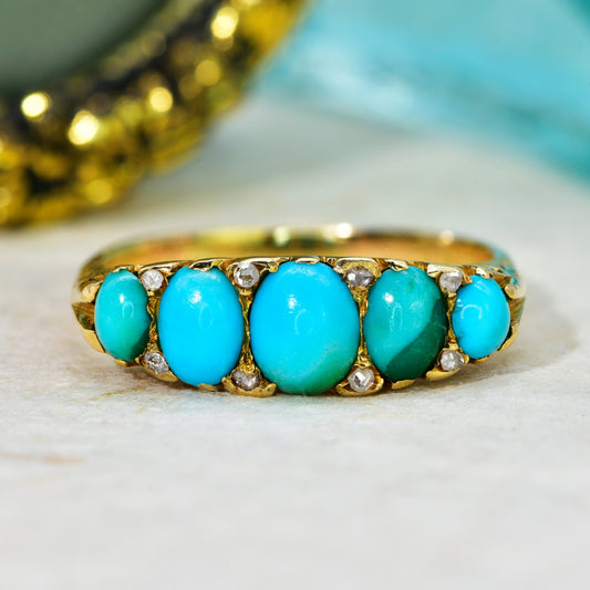 Victorian five stone turquoise and rose cut diamond ring in 18ct yellow gold, circa 1898, with graduated turquoise cabochons and diamond spacers