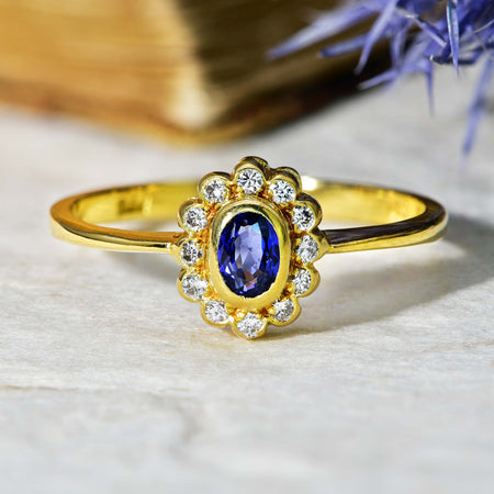 The Vintage 1986 Sapphire and Brilliant Cut Diamond Daisy Ring - Antique Jewellers