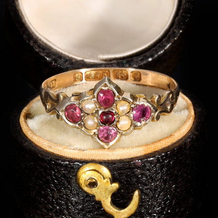 The Antique 1874 Garnet and Seed Pearl Mourning Ring