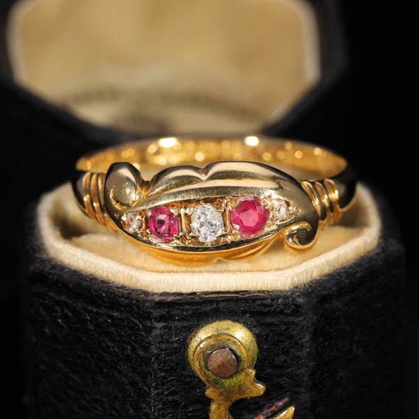 The Antique 1919 Diamond and Ruby Scroll Ring