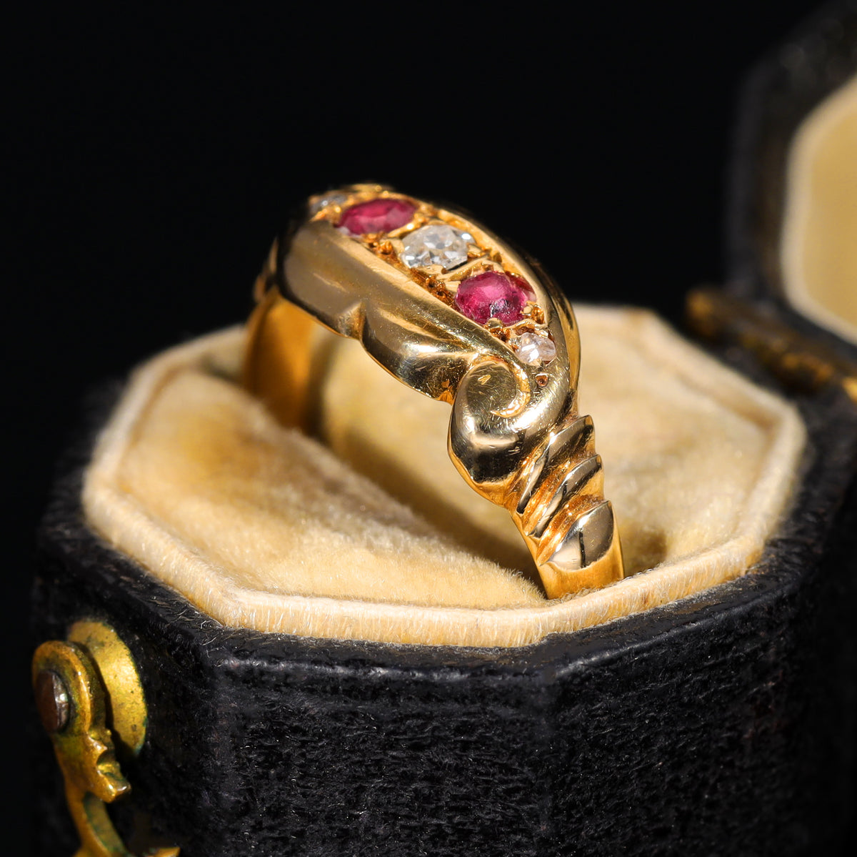 The Antique 1919 Diamond and Ruby Scroll Ring