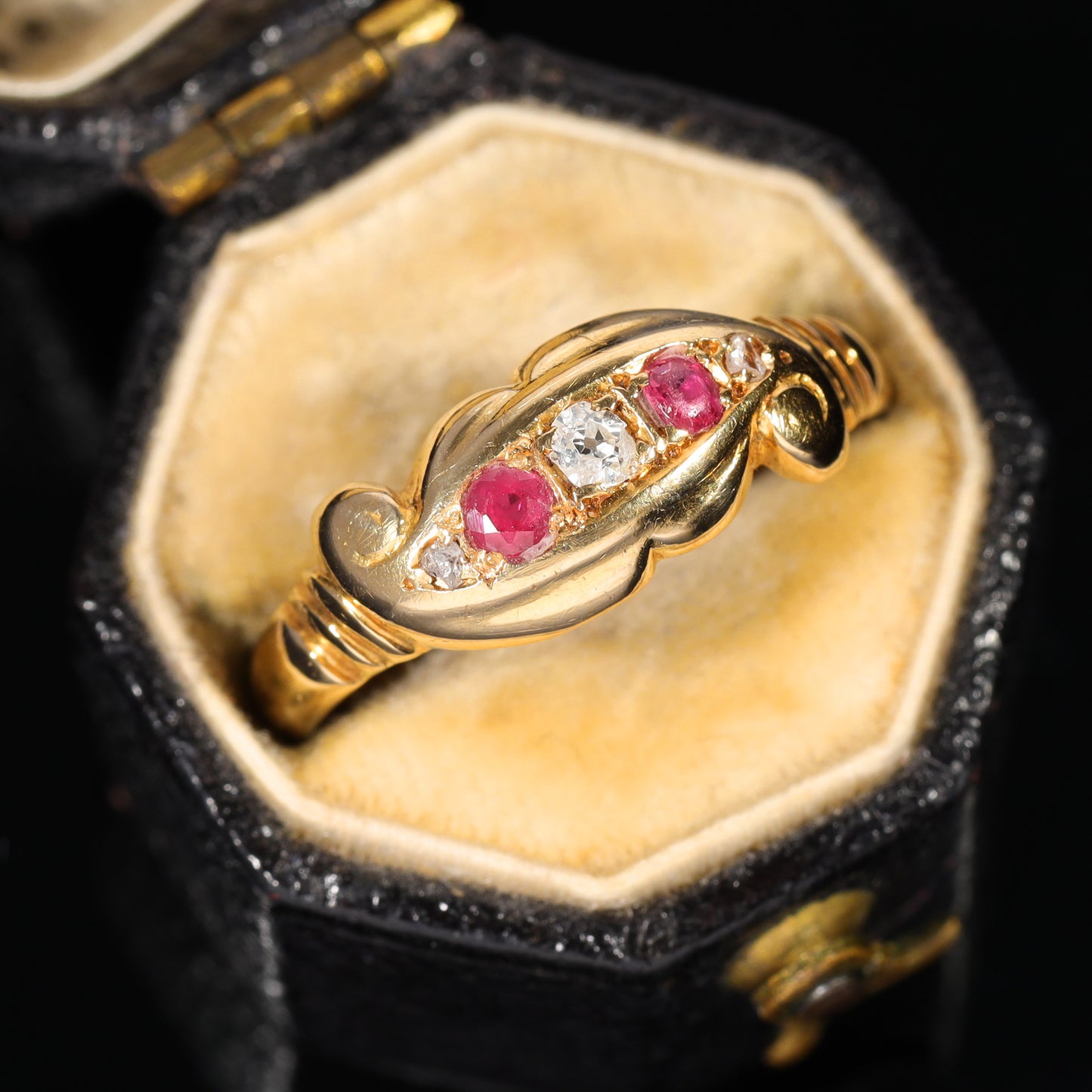 The Antique 1919 Diamond and Ruby Scroll Ring