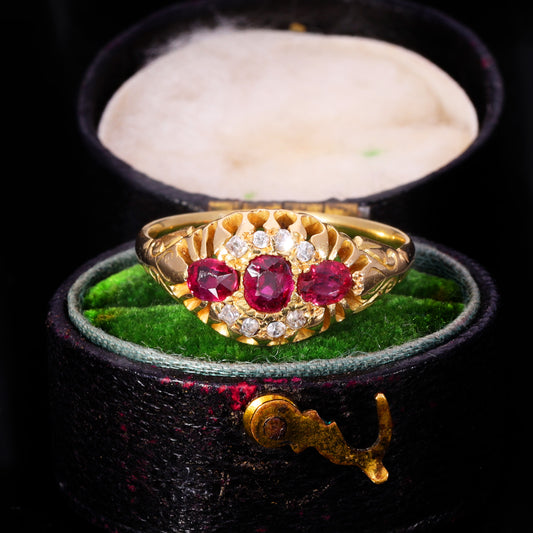 Front view of Victorian ruby and old cut diamond cluster ring in 18ct gold