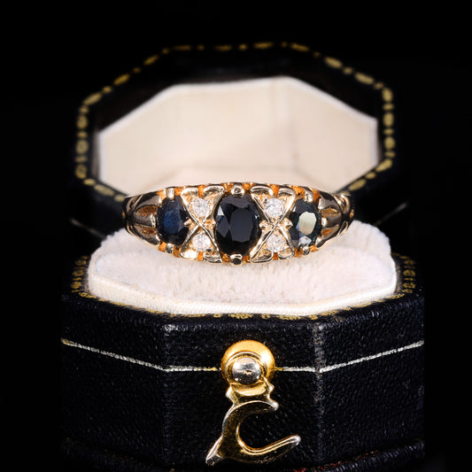 The Vintage 1990 Diamond And Sapphire Flush Set Boat Ring
