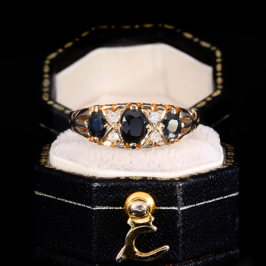 The Vintage 1990 Diamond And Sapphire Flush Set Boat Ring