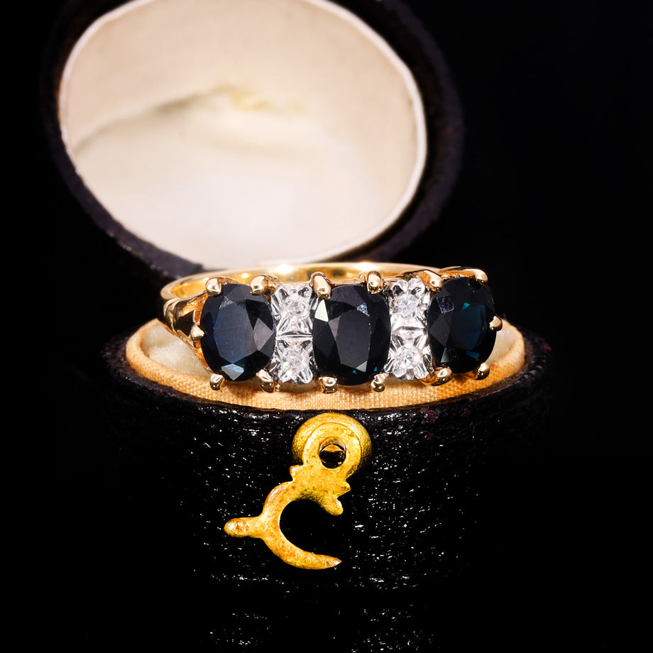 The Vintage Three Cushion Cut Sapphire And Diamond Ring