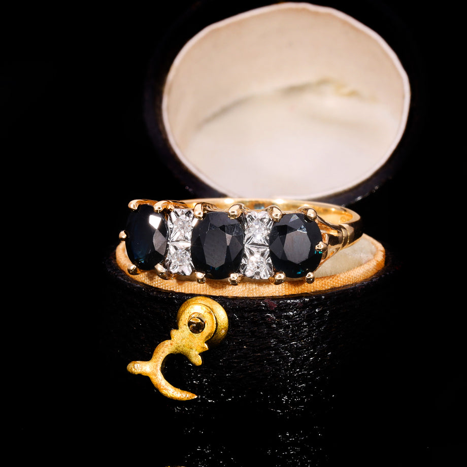 The Vintage Three Cushion Cut Sapphire And Diamond Ring