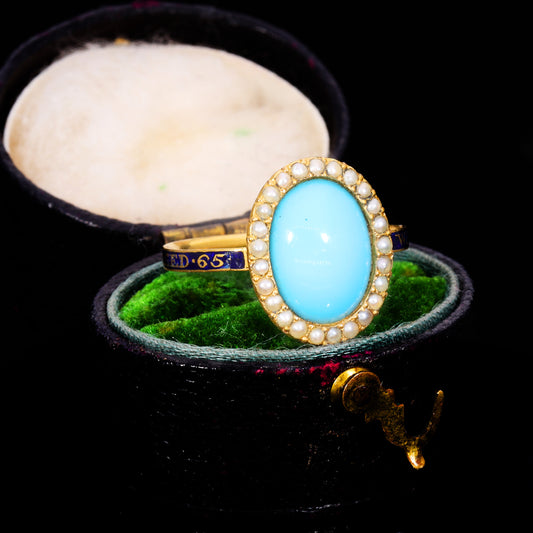 Front view of Georgian turquoise paste and seed pearl cluster mourning ring, 1781