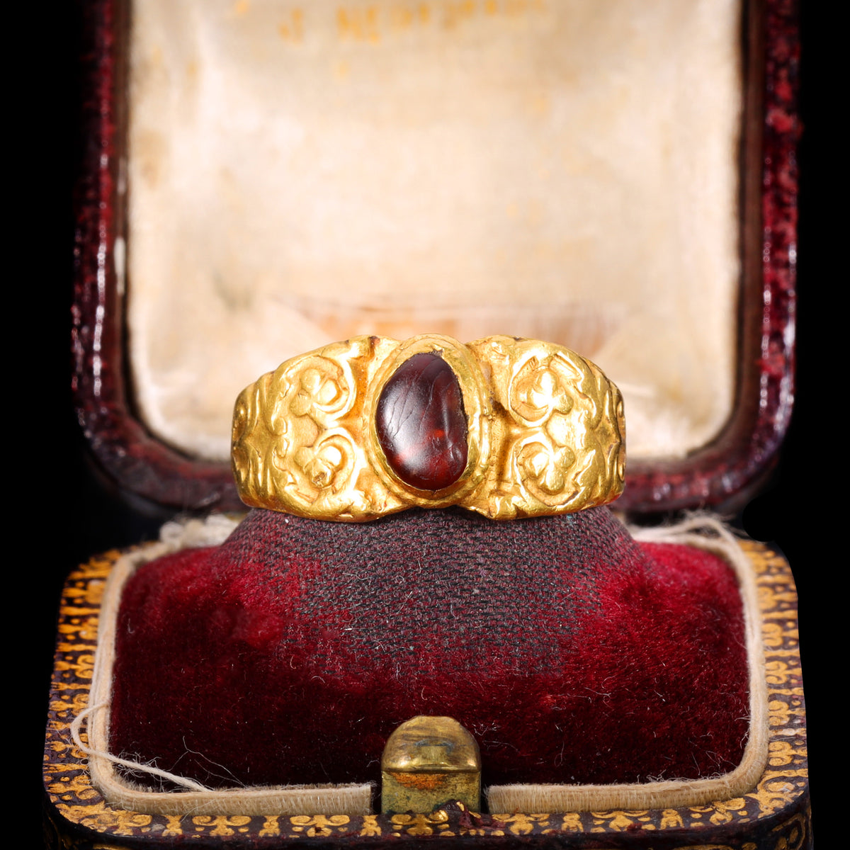 The Ancient Roman Garnet Cabochon Engraved Clover Ring