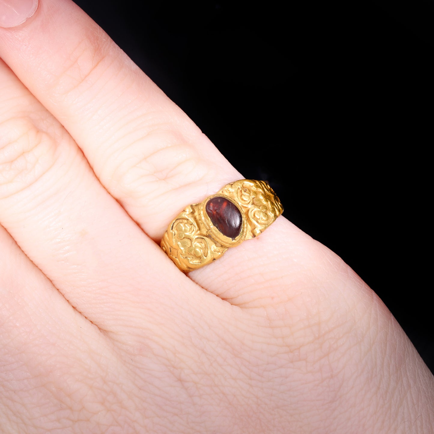 The Ancient Roman Garnet Cabochon Engraved Clover Ring