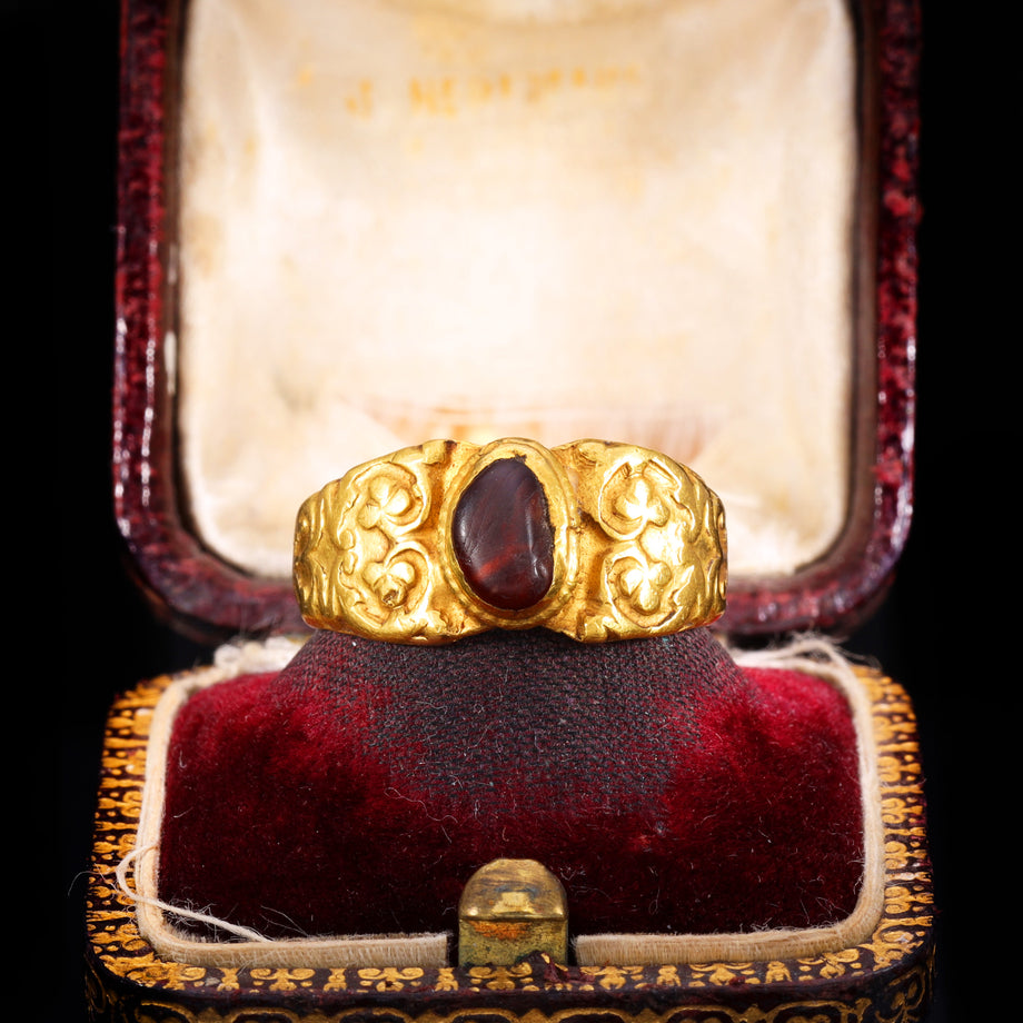 The Ancient Roman Garnet Cabochon Engraved Clover Ring