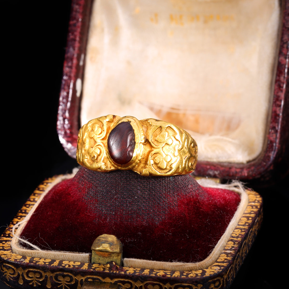 The Ancient Roman Garnet Cabochon Engraved Clover Ring
