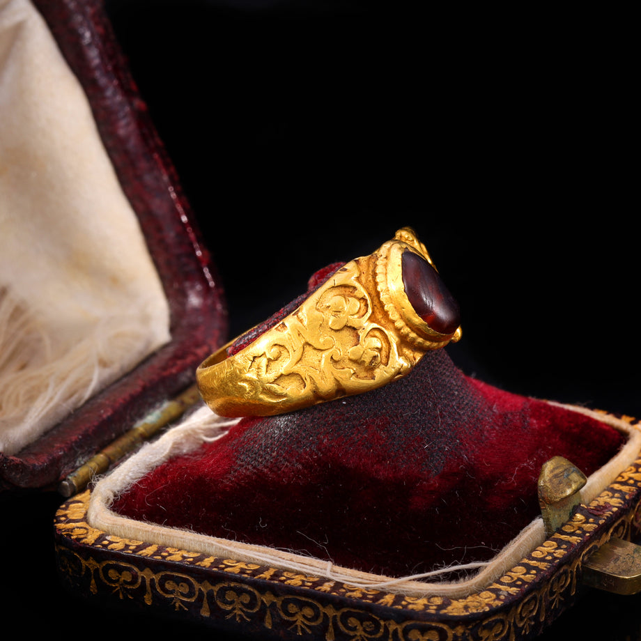 The Ancient Roman Garnet Cabochon Engraved Clover Ring