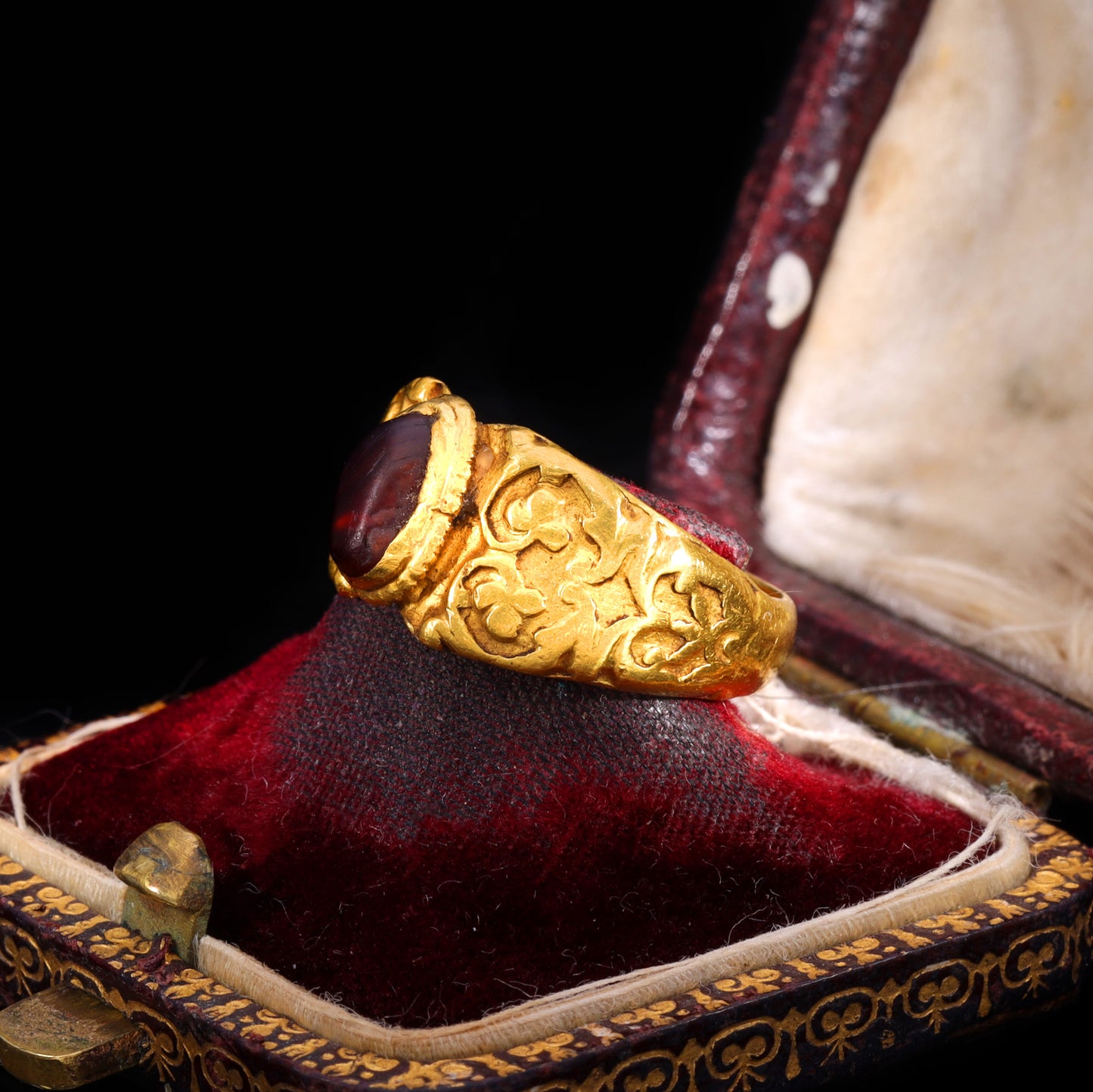 The Ancient Roman Garnet Cabochon Engraved Clover Ring