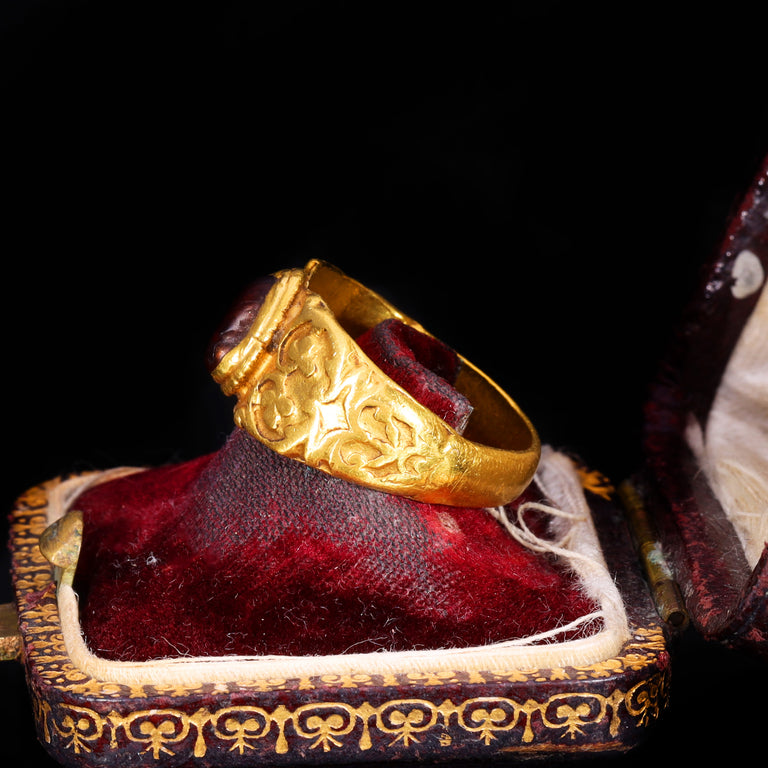 The Ancient Roman Garnet Cabochon Engraved Clover Ring