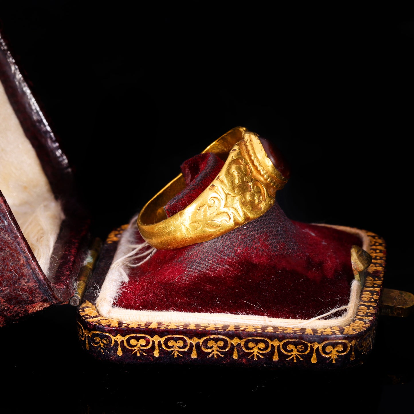 The Ancient Roman Garnet Cabochon Engraved Clover Ring