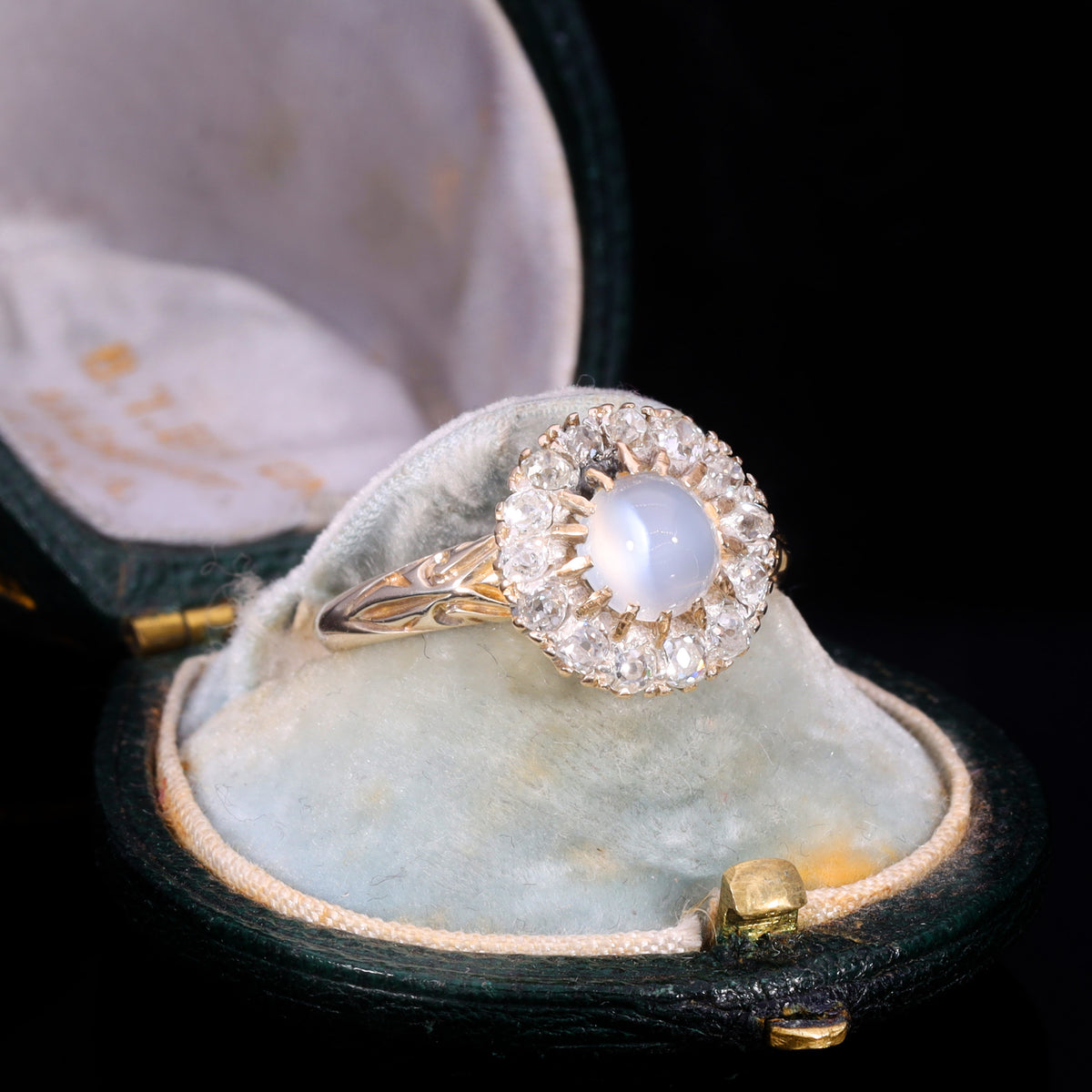 The Antique Victorian Moonstone and Old Cut Diamond Cluster Ring