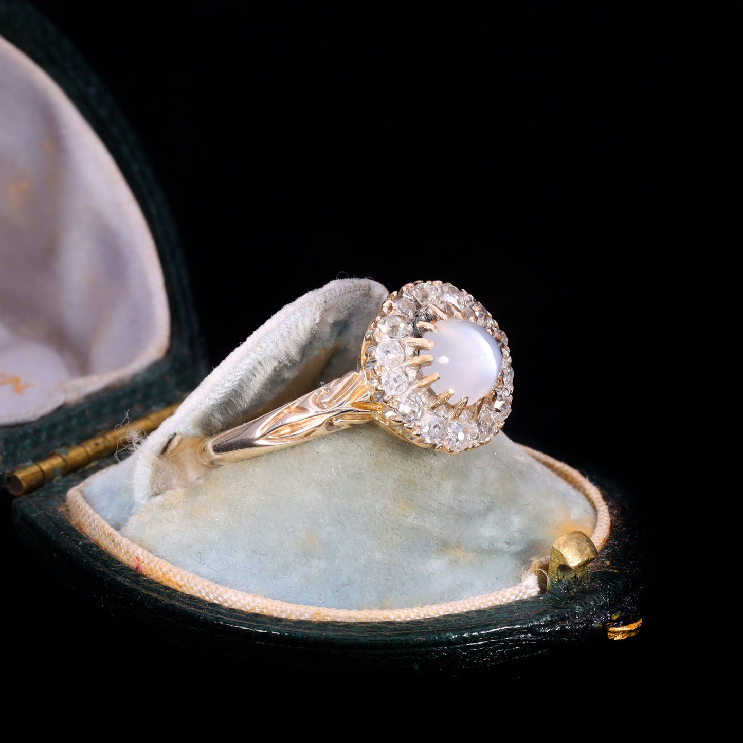 The Antique Victorian Moonstone and Old Cut Diamond Cluster Ring