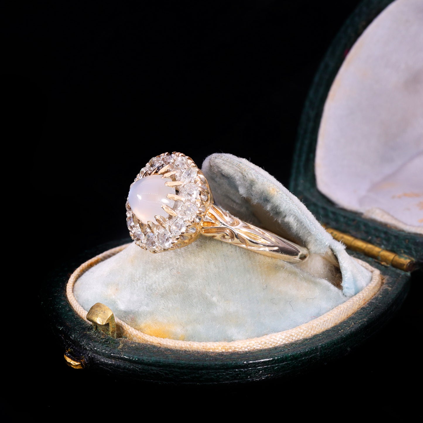 The Antique Victorian Moonstone and Old Cut Diamond Cluster Ring