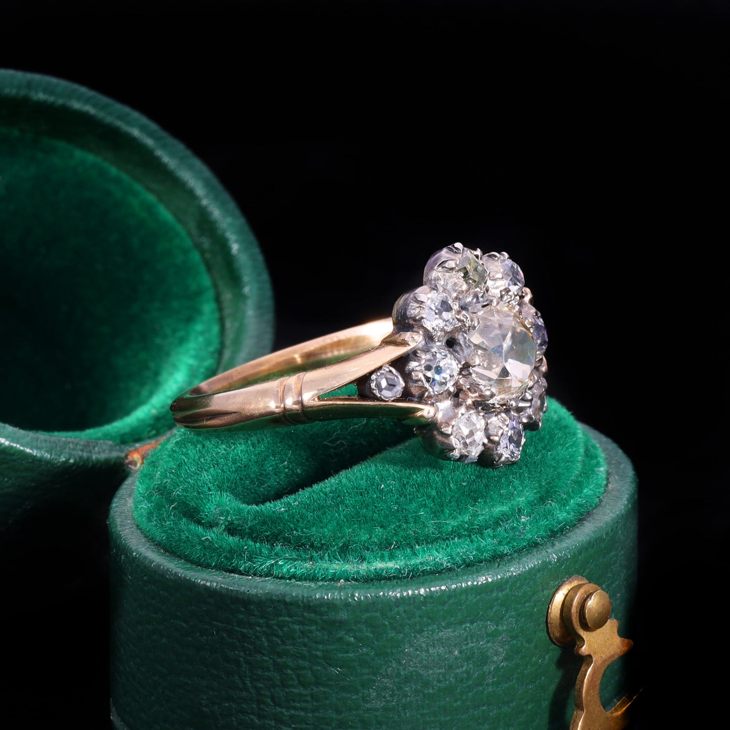 The Antique Georgian Eleven Old European Cut Diamond Cluster Ring
