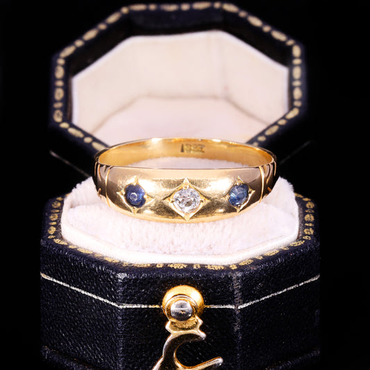 Front view of Victorian 18ct gold three-stone sapphire and diamond gypsy ring