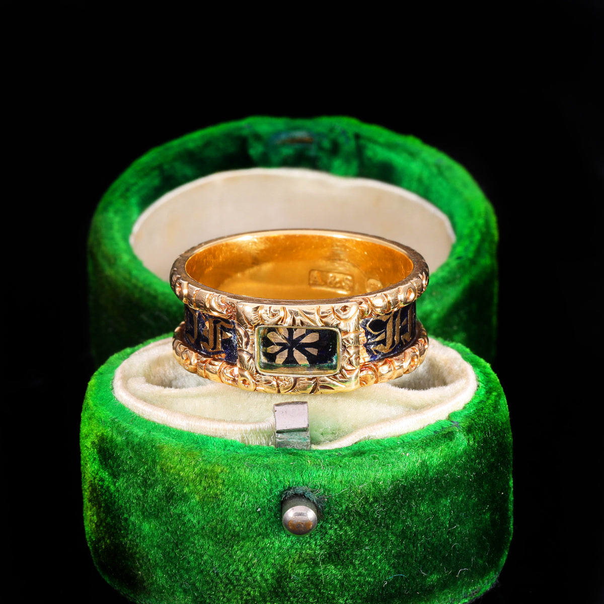 Front view of Victorian gold mourning band with blue enamel and central motif