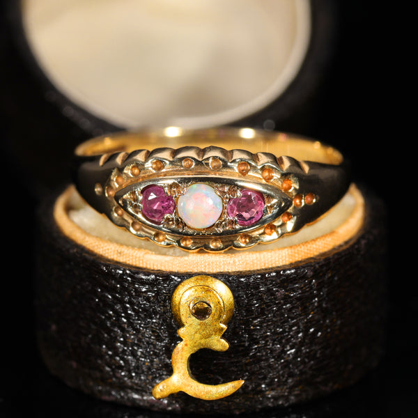 The Vintage 1997 Ruby and Opal Boat Ring