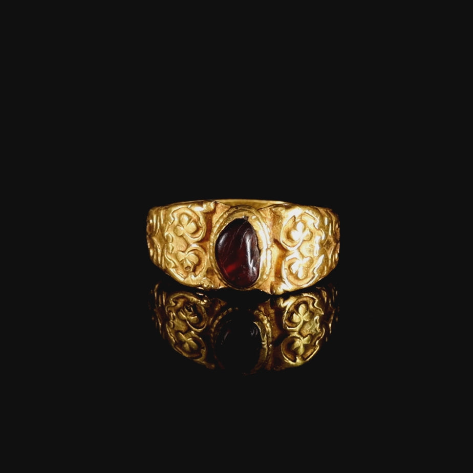 The Ancient Roman Garnet Cabochon Engraved Clover Ring